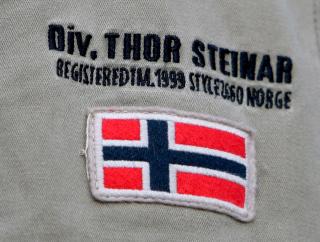 NORSK FLAGG: Nazistmerket er sv�rt norskinspirert og bruker flagget p� plaggene.. Den norske staten gikk i 2006 til sak mot kjeden for ulovlig bruk av flagget. Foto: EPA/SCANPIX