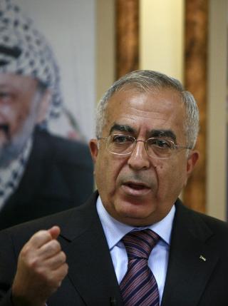 TIL KONFERANSEN: Salam Fayyad skal m�te utenriksminister Jonas Gahr St�re i Oslo p� s�ndag. Dagen etter deltar de begge p� giverlandskonferansen for palestinerne. Foto: FADI AURORI/REUTERS/SCANPIX