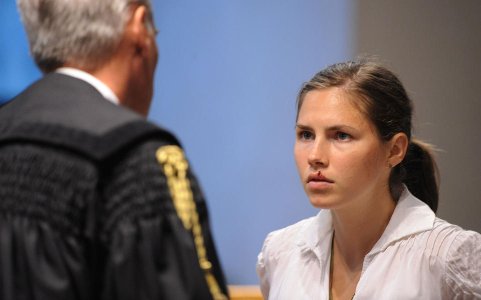 DRAPSTILTALT:  Amanda Knox er sammen med sin ekskj�reste tiltalt for � ha drept en britisk utvekslingsstudent i Italia for to �r siden. Foto: AFP PHOTO / TIZIANA FABI
/Scanpix