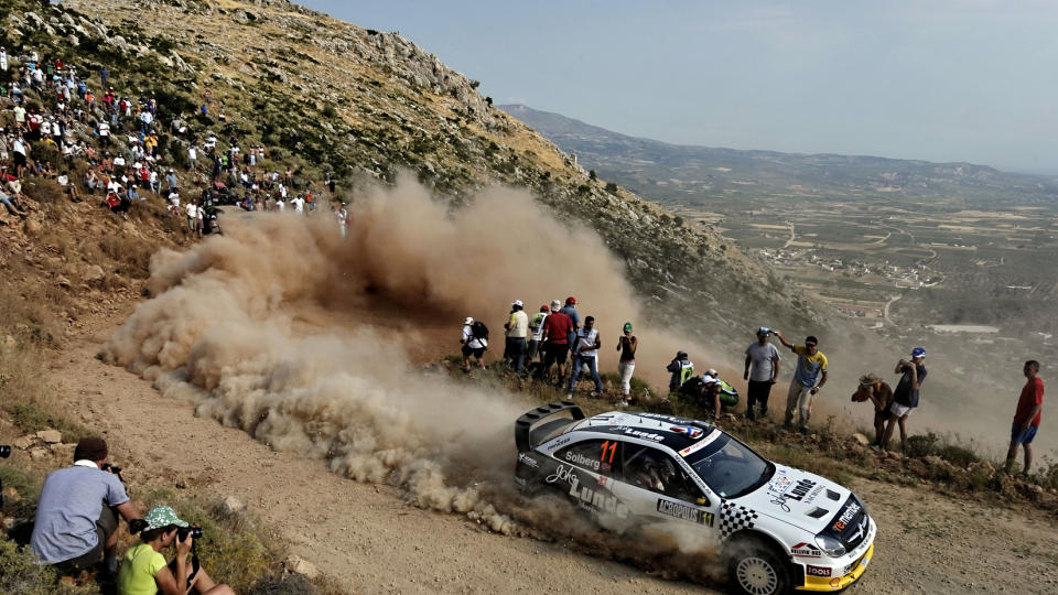 JAKTER SEIER: Petter Solberg jakter p� Mikko Hirvonen og sin f�rste VM-seier p� fire �r under Rally Akropolis.Foto: SCANPIX / AFP PHOTO / Louisa GOULIAMAKI