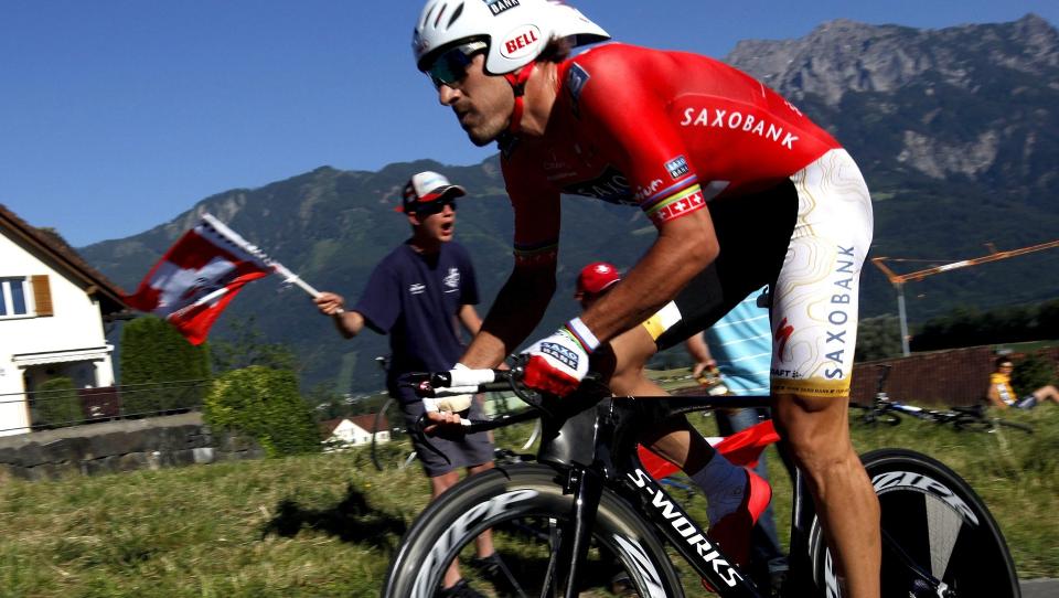 epa01760421 Switzerland's Fabian Cancellara from team Saxo Bank, is on his way to win the 1st stage, a 7,8 km race against the clock, from Mauren to Ruggell, at the 73nd Tour de Suisse UCI ProTour cycling race, in Ruggell, Liechtenstein, 13 June 2009.  EPA/JEAN-CHRISTOPHE BOTT