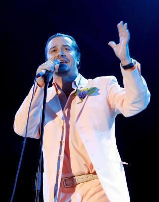 DIGGER FARMERS MARKET: Faith No More-vokalist og plateselskapeier Mike Patton har lagt seg langflat etter det norske bandet.  Foto: EPA/PETER KLAUNZER