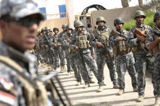 I DERES HENDER: N�r amerikanerne gradvis trekker seg ut er det den irakiske h�ren som skal ta over. Foto: AFP PHOTO / AHMAD AL-RUBAYE/SCANPIX