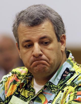FIKK SMERTER OG PUSTEPROBLEMER: Larry Roberta g�r til s�ksm�l mot KBR. Foto: AP Photo/Rick Bowmer/Scanpix