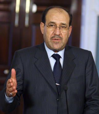 HAR SATT NED FOTEN: I fjor plasserte Iraks statsminister Nouri al-Maliki ut nesten ti tusen irakiske soldater langs the trigger line, i h�p om � ta tilbake kontrollen over flere av de omstridte omr�dene. al-Maliki og den kurdiske presidenten Massoud Barzani har ikke snakket sammen det siste �ret. FOTO: FP PHOTO/ Chris KLEPONIS/SCANPIX