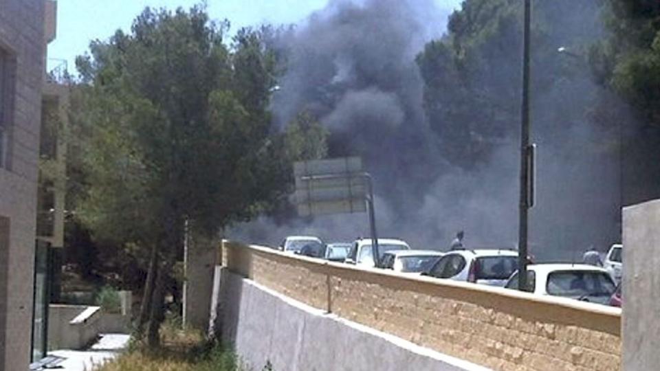 TO DREPT: To politimenn ble drept etter at en bilbombe eksploderte p� Mallorca tidligere i dag. Foto:  EPA/CADENASER.COM /SCANPIX