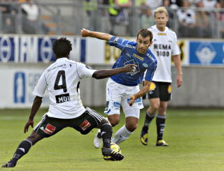 VALSET OVER RBK: Anthony Annan OG rbk klarte ikke � holde takten mot Magne Hoseth og Molde i g�r. Foto:Arnt E. Folvik/Dagbladet