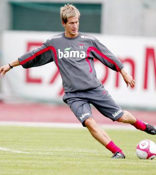 TROR CITY KAN BLANDE SEG: Morten Gamst Pedersen tror Manchester City med gamlesjefen Mark Hughes kan blande seg inn i topp fire.Foto: Stian Lysberg Solum, Scanpix