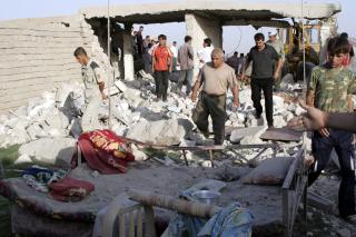 VOLDSOMME SKADER: Minst 30 people ble drept og 130 skadd etter dette angrepet i Khaznah, n�r Mosul. Foto: EPA/NAWRAS AL-TA'EI/Scanpix