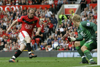 SCORER 20 M�L: Wayne Rooney ble matchvinner for United i g�r. Sjefen mener han greit skal score 20 m�l denne sesongen. Foto: AP/Tim Hales