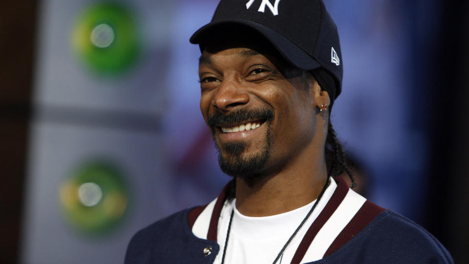 REDD LYSE NETTER SKAL F�RE TIL MER TV-SPILLING: I tillegg til � v�re en av verdens mest kjente rappere er Snoop Dogg ogs� notorisk kjent for tv-spillingen sin. Foto: Jason DeCrow/AP