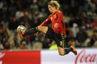 LIVERPOOL OG SPANIA: Fernando Torres blir å se både i Champions League og i Fotball-VM. Foto: AFP/ROBERTO SCHMIDT LIVERPOOL OG SPANIA: Fernando Torres blir å se både i Champions League og i Fotball-VM. Foto: AFP/ROBERTO SCHMIDT