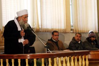 BLE ANKLAGET FOR BRUDD P� SHARIA: Mulla Qari Mushtaq under rettssaken. Foto: EPA/S. SABAWOON