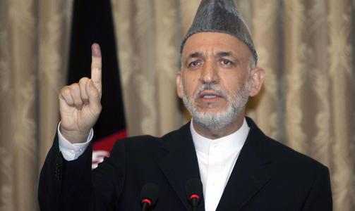 AFGHANISTANS PRESIDENT: Hamid Karzai fikk mye st�tte fra den statsdrevene TV-kanalen RTA under valget. Foto: EPA/OLIVIER MATTHYS