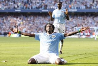 SKAL STRAFFES: Alex Ferguson mener Adebayor fortjener karantene b�de sparket og feiringen foran Arsenal-fansen. Foto: AP/Jon Super