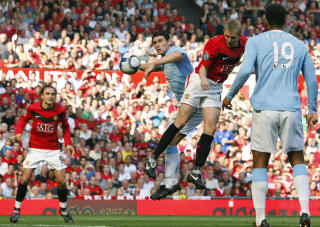 SCORET TO: Darren Fletcher l� lenge an til � bli den store United-helten med sine to scoringer, men det var f�r Craig Bellamy utliknet i siste minutt. Og f�r Michael Owen kom inn for � avgj�re p� overtid.Foto: SCANPIX/AP/Jon Super