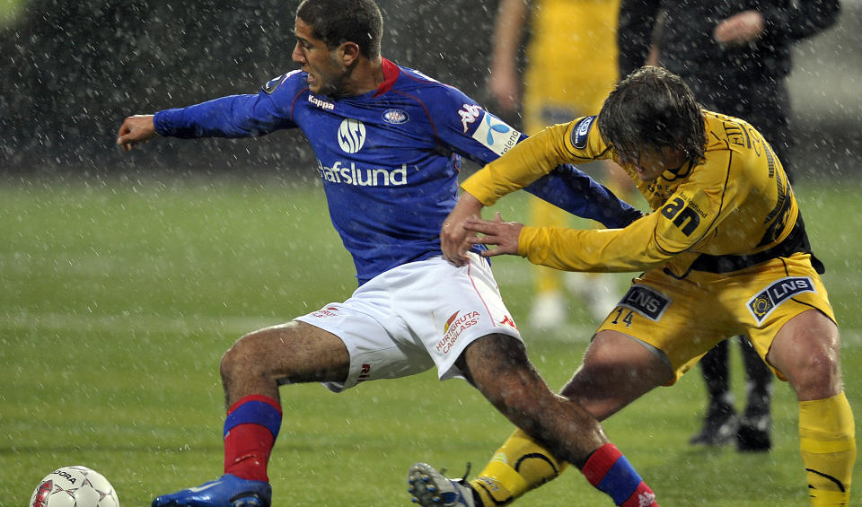 T�FFE FORHOLD: Amin Nouri og Trond Fredrik Ludvigsen kriget i regn og stormkast. Foto: Anders Vanderloock / SCANPIX