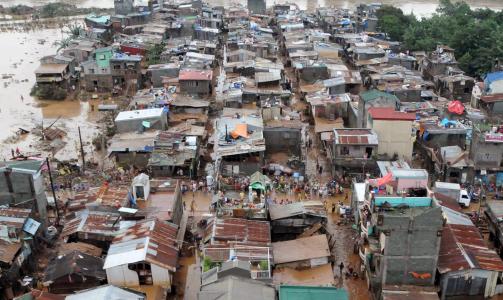 OVERSV�MMELSER: Bilde fra forstaden Marikina City �st for Manila. Foto: AP/SCANPIX