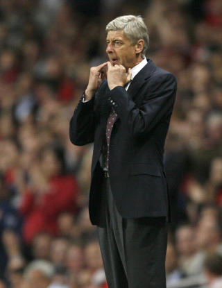 HYLLER VINNERVILJEN: Arsene Wenger er imponert over den iboende viljen til � vinne i Arsenal-laget.Foto: SCANPIX/AFP PHOTO/Ian Kington