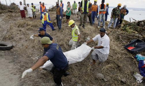 OMKOMNE: Minst 176 personer mistet livet p� Samoa-�yene. Foto: AP Photo/Scanpix