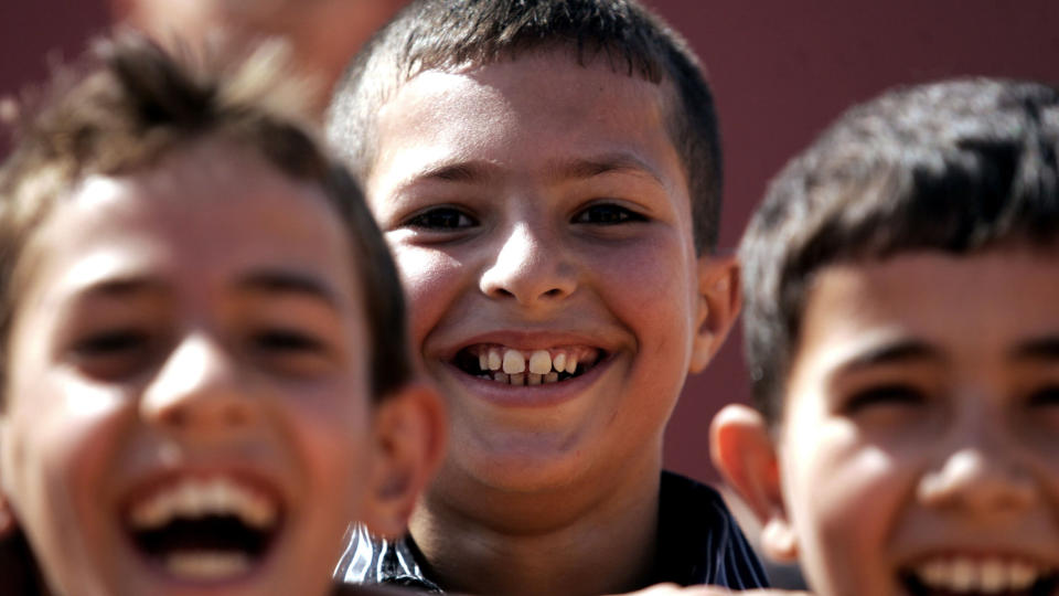 EN AV FIRE: Muslimer utgj�r hver fjerde person i verden, viser ny rapport. Disse palestinske guttene feirer Eid i Jenin p� Vestbredden i september i �r.Illustrasjonsfoto: AFP PHOTO/SAIF DAHLAH