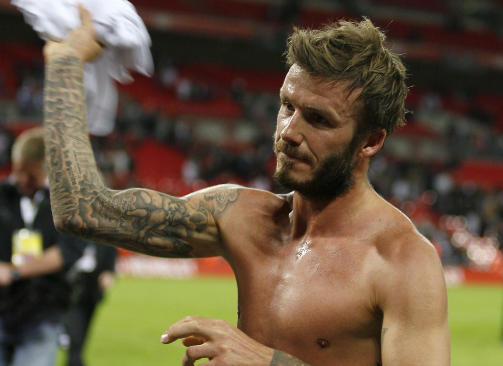 H�RETE, MEN GOD: David Beckham sier det er 95 prosent sikkert at han drar tilbake til Milan. Foto: Scanpix
