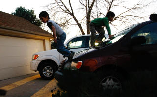 VILTRE GUTTER: Falcon Heene (6) og broren Ryo (8). Foto: John Moore/Getty Images/AFP/Scanpix