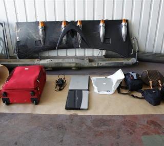 LAPTOPER: Datamaskiner og fotoutstyr utgj�r noe av beslaget. Foto: POLITIET