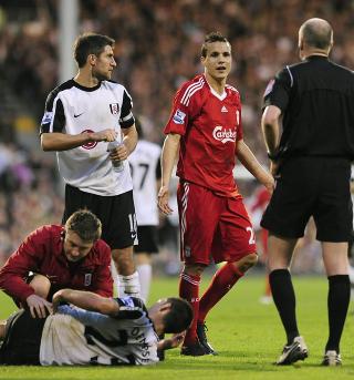 KJIP DEBUT: Philipp Degen spilte sin f�rste ligakamp fra start for Liverpool. Etter 79 minutter ble han sendt rett av banen etter fellingen av Clint Dempsey.Foto: Toby Melville, Reuters/Scanpix