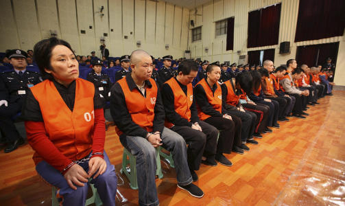 15.000 MISTENKTE: Til n� har myndighetene i Chongqing arrestert over 15.000 mistenkte &mdash; kjeltringer, prominente forretningsmenn og 14 profilerte myndighetspersoner. Seks gjengledere har allerede blitt d�mt til d�den for blant annet machete-drap og utpressing. Foto: SCANPIX