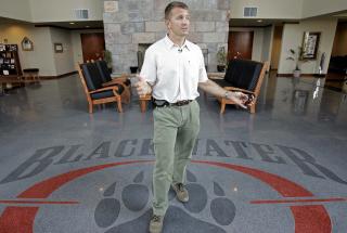 KONTROVERSIELL: Gigantsikkerhetsselskapet Blackwater, n�v�rende XE, har m�tt flere grove beskyldninger for sitt virke i Irak. Foto: AP Photo/Gerry Broome/Scanpix