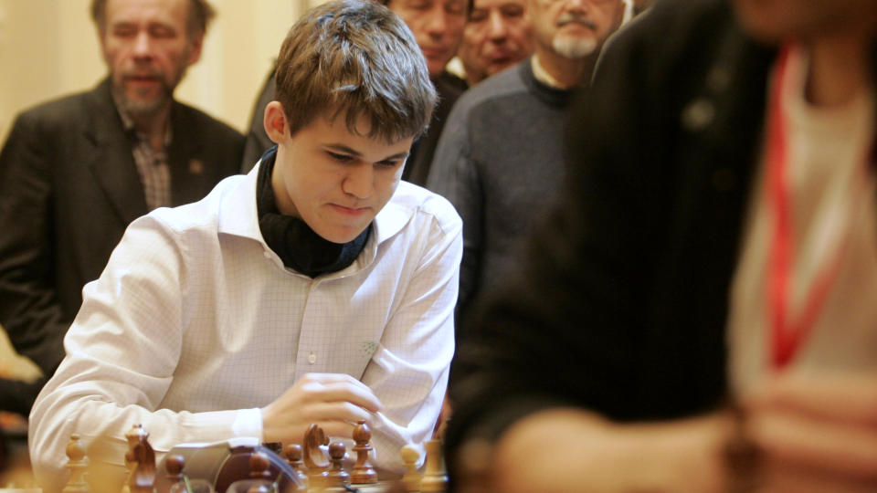 Norwegian chess player Magnus Carlsen, left, is seen during the finals of the World Blitz Championship 2009 in Moscow, Wednesday, Nov. 18, 2009. Magnus Carlsen won the championship. (AP Photo)