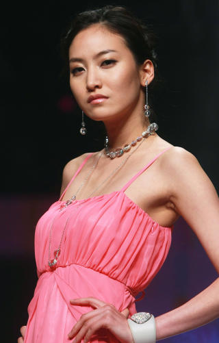 TOPPMODELL: Avd�de Daul Kim ble hyllet for sin stilsans. Foto: Yonhap, Han Mi-hee/SCANPIX