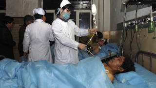 ALVORLIG SKADET: 29 personer er innlagt p� sykehus, og tilstanden er alvorlig for seks av dem. Foto: AP Photo/Xinhua/Wang Song/Scanpix