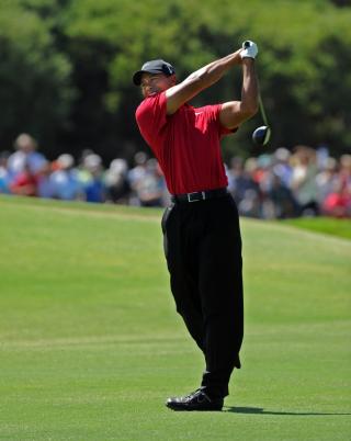 GOD FORM: Tiger Woods ble behandlet p� sykehuset, men s� skrevet ut i god form eller krasjen. Foto: Julian Smith, EPA/Scanpix