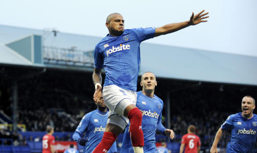 SLO GODT FRA SEG: Det var fullt fortjent da Kevin Prince-Boateng utlignet for Portsmouth mot Manchester United i f�rste omgang, men vertene klarte ikke holde dampen oppe etter hvilen.Foto: SCANPIX/AFP PHOTO/Adrian Dennis
