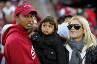 FAMILIEN: Tiger Woods med datteren Sam Alexis og sin svenske kone Elin. Foto: Ezra Shaw/Getty Images/AFP