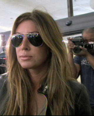 ELSKERINNE? De nye utroskapsbeskyldningene kommer kort tid etter at Tigers angiveldige forhold til Rachel Uchitel ble kjent. Hun har imidlertid nektet for at hun er �rsaken til Woods' bilulykke i helga. Foto: SCANPIX