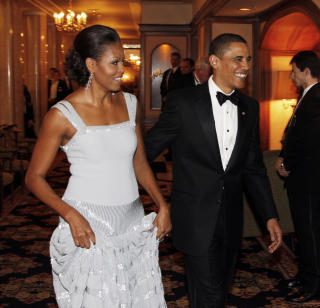 HEDERSGJESTEN: 
President og prisvinner Barack Obama sammen med kona Michelle.
Foto: Lise �serud / Scanpix POOL