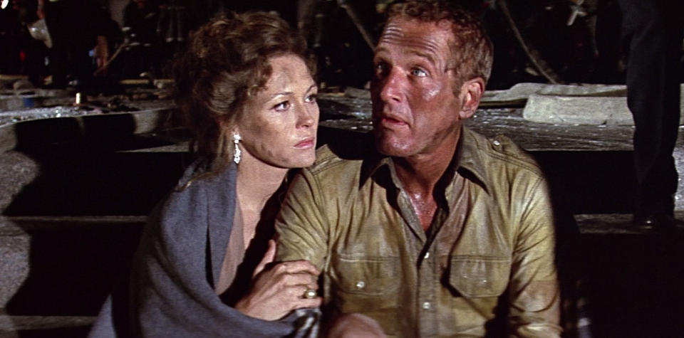 Stillheten etterp�: En aften i en skyskraper i full fyr gj�r noe med en. Men Faye Dunaway og Paul Newman klarer likevel � se glamour�se ut.