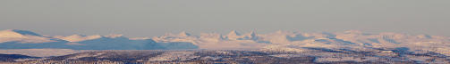 HALVE NORGE:Fra toppen av anlegget ser du halve Norge i 360 grader. Her ser vi Jotunheimens spisse topper i solnedgang.