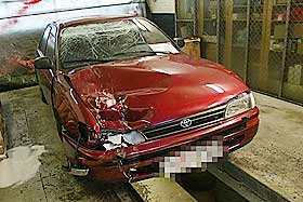 FUNNET: Dette er bilen som traff mopeden til den 17 �r gamle gutten. Den ble fors�kt gjemt i et sandtak, men en turg�er varslet politiet.