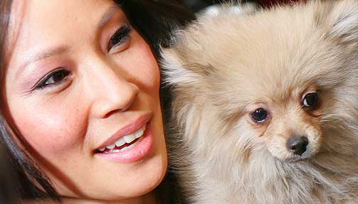 LUCY LUI:  Liker ogs� hunder.