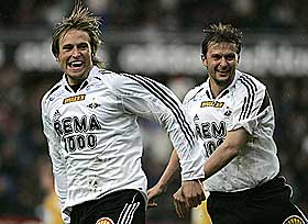  M�LSCORERE:  B�de Torstein Helstad og Roar Strand puttet for Rosenborg.