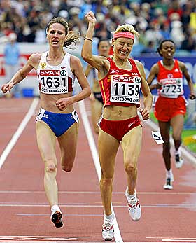 VANT: Marta Dominguez fra Spania vant 5000 meter p� tiden 14.56,18, som var soleklar �rsbeste for henne. Hun slo Liliya Shobukhova fra Russland i spurten.