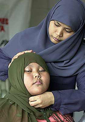 N�R SKAL HIJABEN P�? I f�lge nettstedet Islam.no fra 8 - 9 �rsalderen.