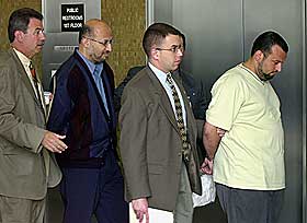 ARRESTERT I 2003: Sami Al-Arian sammen ble arrestert sammen med Hatim Naji Fariz (til h�yre) og to andre i februar 2003.