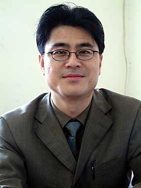 P� TREDJE �RET: Journalisten Shi Tao sitter fengslet p� tredje �ret for � ha avsl�rt statshemmeligheter. Han har sju �r igjen av dommen.