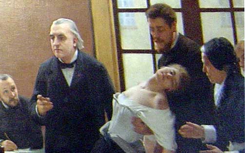 PROFESSOREN I AKSJON: Jean-Martin Charcot viser fram pasienten �Blanche� (Marie Wittman) ha et hysterisk anfall ved Salp�tri�re i Paris.