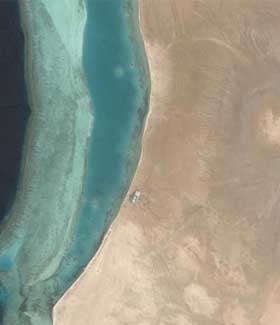 LANGS R�DEHAVET: Satelittbilde fra omr�det hvor megabyen er under bygging. Har du Google Earth installert, kan du se satelittbilder av byen via denne lenken.